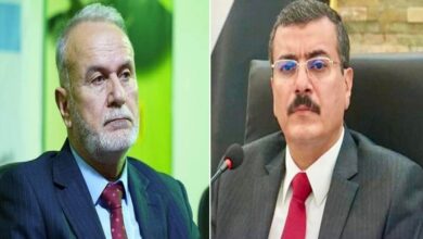 على اليسار عمار القيسي وعلى اليمين عبد المطلب عليوي
