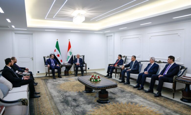وزير الخارجية السوري ونظيره العراق